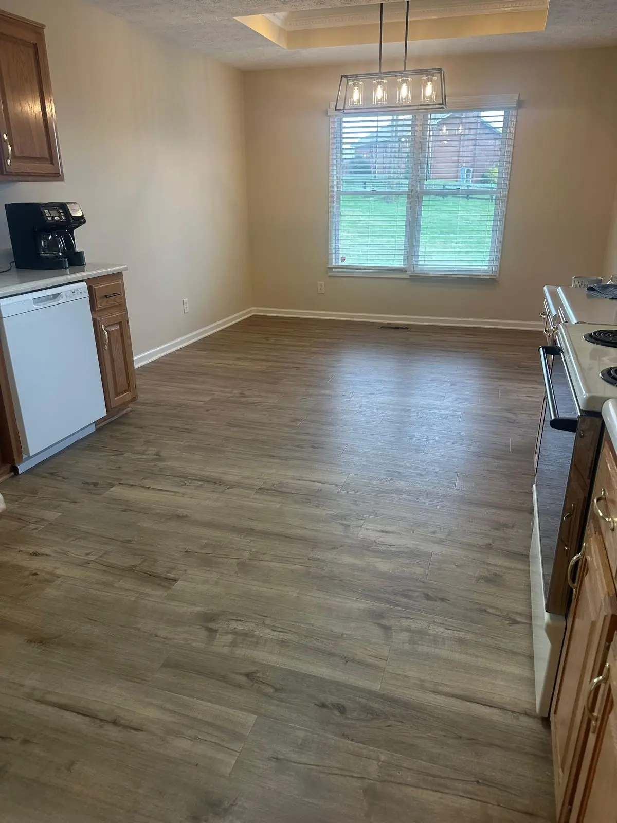 Wide-Plank LVP · Open Kitchen